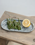 Oval marble tray - Small. Light and dark variant.